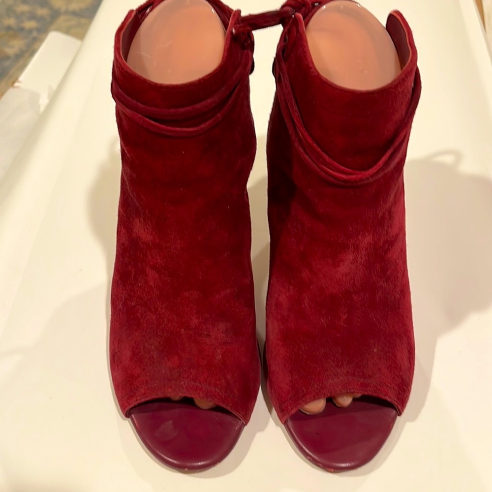 Rich, suede burgandy bootie with open toe and back.